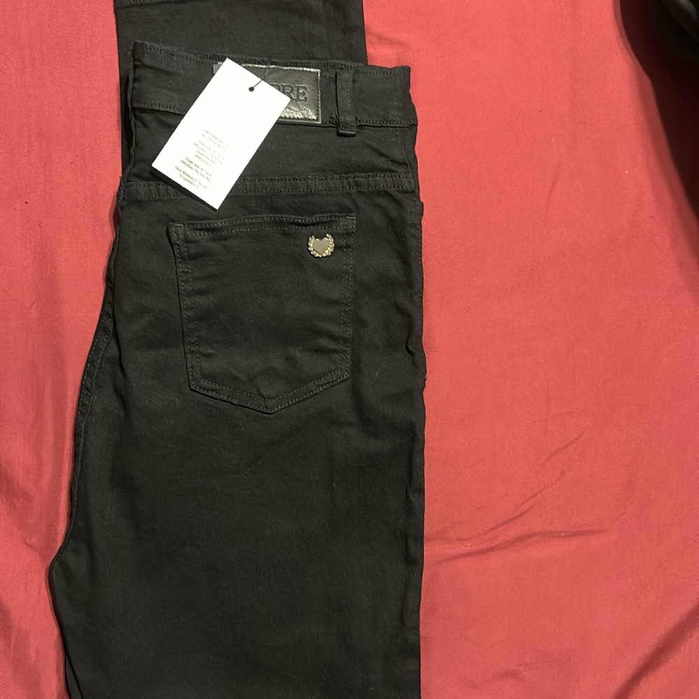 Never worn chipre jeans. Size 31.